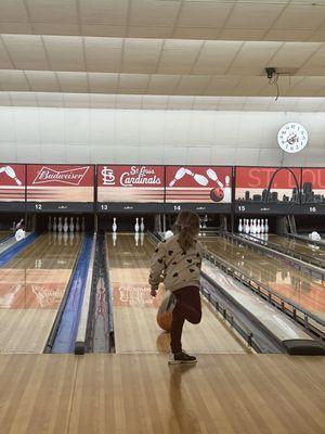 One of the other kids bowling