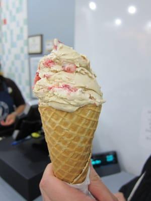 Small coffee waffle cone with strawberries as the "mix-in"