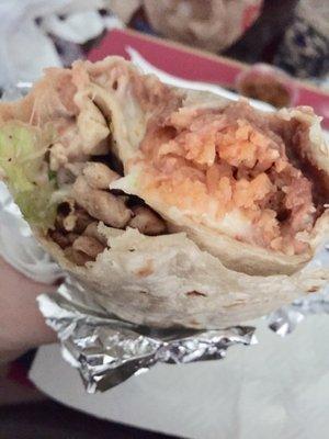 Regular Pollo Burrito w/out Pico & Salsa. Chicken, Rice, Beans, Lettuce, Cheese, Crema. Huge and delicious!