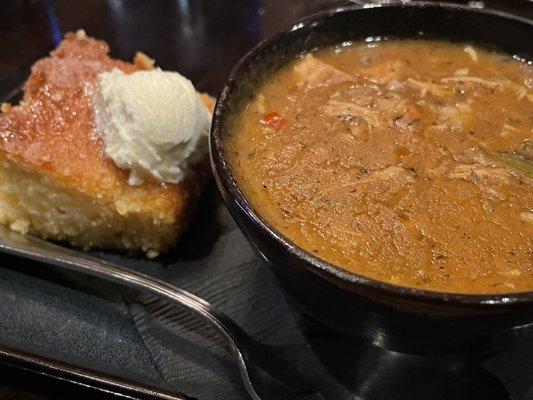 Gumbo, cup with slice of cornbread.