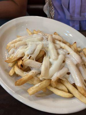 "Mozzarella Cheese Fries." About 11 fries actually got cheese.....hard, sliced "mozzarella" cheese.