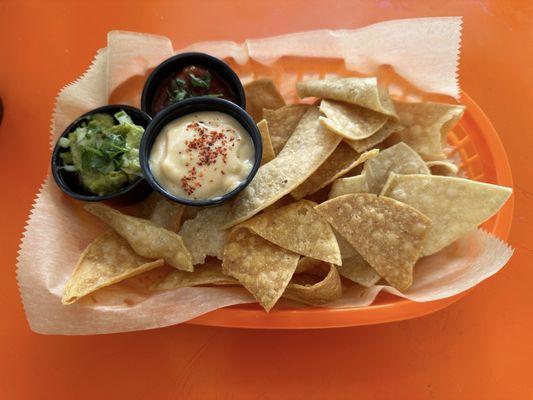 Nachos with three of their dips