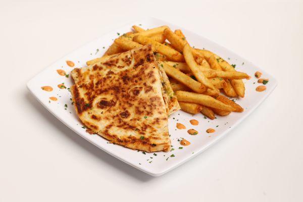 Greedy Chicken Quesadilla served with fries