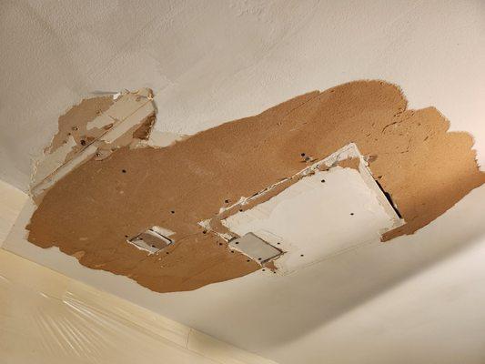 Ceiling damaged from plumbing leak.