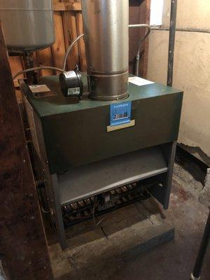 Getting ready for winter season. Maintenance on a boiler.