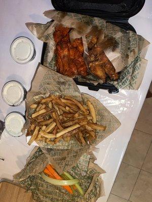 24pc Family Pack (hot wings and hot honey rub), Seasoned Fries, and Veggie Sticks