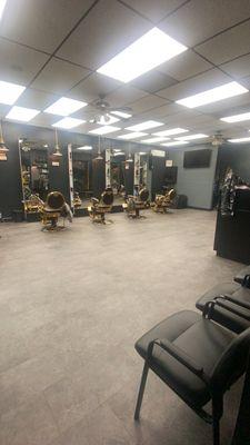 nice golden chairs and barber stations