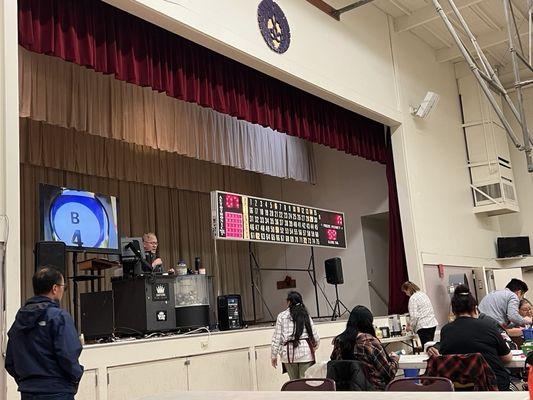 Large display at the front of the hall, and a smaller one at the back.