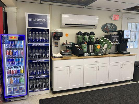 This is our coffee station with our mini Redbull cooler and Smart Water display