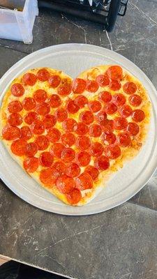 Go get your valentine their heart shaped pizza at Bruno's pizzeria .