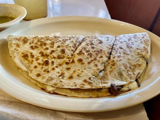 Quesadilla with optional fajita beef. Huge and packed with flavor