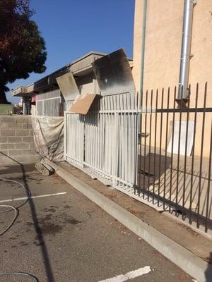 Wrought iron fence primed and painted