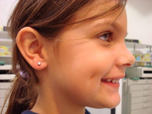 5 year old initial lobe piercings. 14k Solid GoldBy: Roger "Rabb!t" Rodriguez