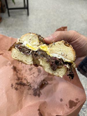 Short rib, egg and cheese on House baked Everything Bagel!