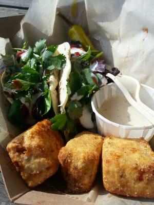 Brisket tacos with fried Mac and cheese.