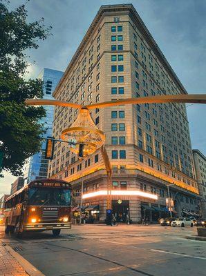 The Funny Bus in Place House Square underneath the world's 2nd largest outdoor chandelier!