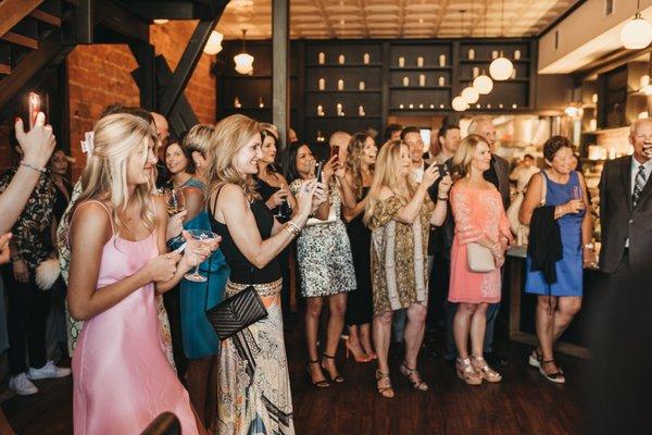 Gathering downstairs for an intimate standing ceremony.

Photography by Yuriy Manchik.