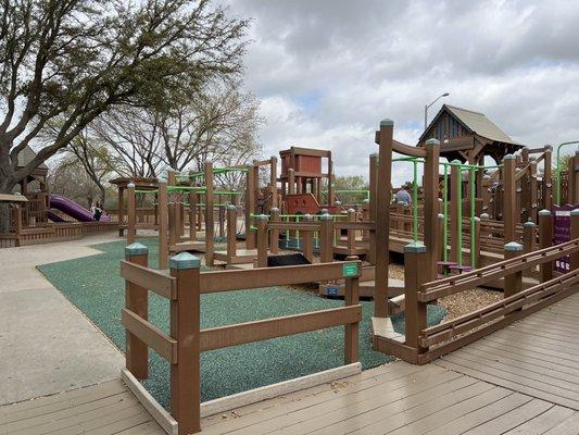 Playground has combo of mulch and rubber flooring.