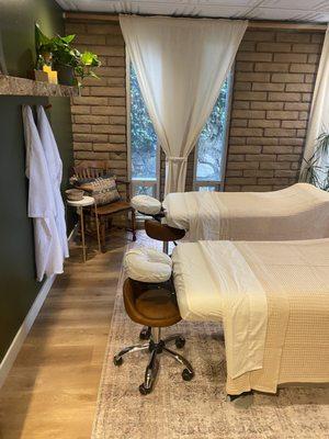 Our couples massage room- heated beds, robes, slippers, hot towel warmer and tranquil music