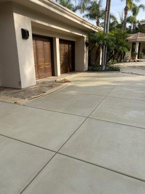 Driveway concrete restoration, acid wash, deep cleaning, staining with grey mutual color and sealing .