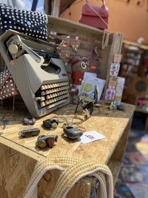 Shop our hand selected local artists collections!  Vintage college, rock jewelry, and vintage figurines, to name a few!