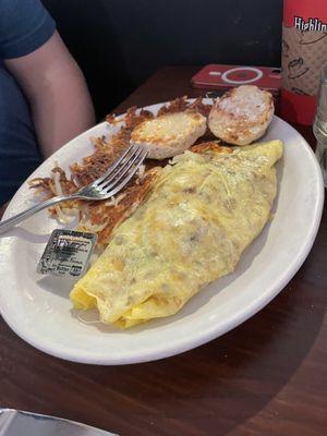 Carnivore Omelette with biscuit and crispy hashbrowns