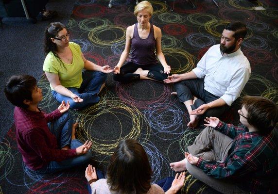 Meditation during an office yoga class