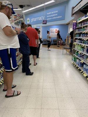 Pharmacy pick-up line is 8 customers deep Saturday afternoon 9/17/22. Drive-through closed.