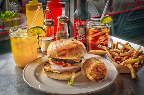 Deluxe Pork Burger, hand cut fries, Pig Iron Cola, Peach Margarita!