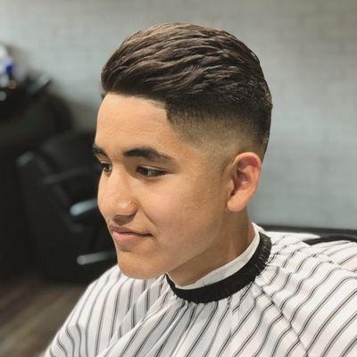 Low skin fade slickback