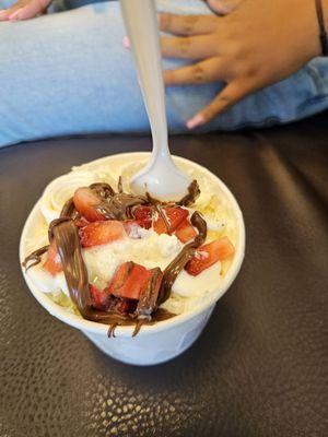 Vanilla rolled ice cream with Nutella and fresh strawberries