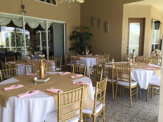 These are the gold Chivari (bamboo) chairs. The drink station, buffet line.