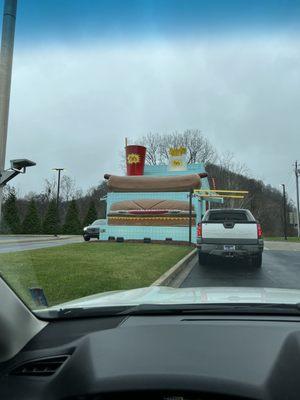 Drive thru lane. You can't miss the buildings!