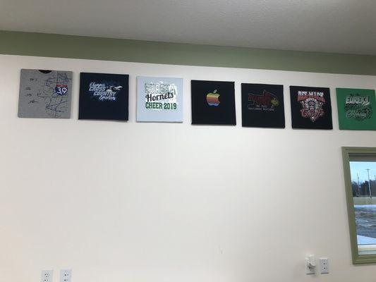 Shirts on the wall, including the new Eye39 shirt!