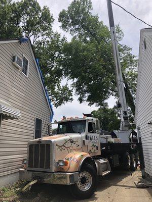 Crane Job Tree on Garage Akron 2019