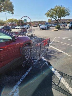 Cart hit my car hard and has dents.