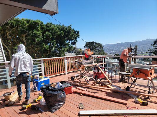 Deck repair removed damaged balusters and damaged decking boards and replaced with new redwood material.