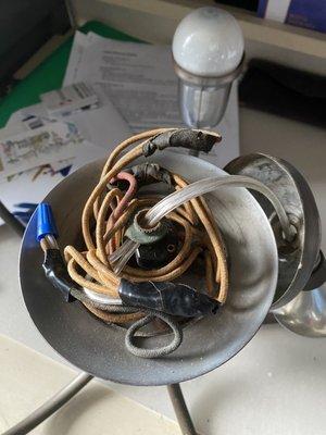 All the old wiring is still in the lamp - so much for "rewiring" job!