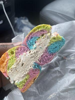 Rainbow bagel with cinnamon bun cream cheese