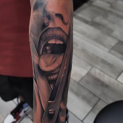 Badass black and grey tattoo done by Mike Chagolla.