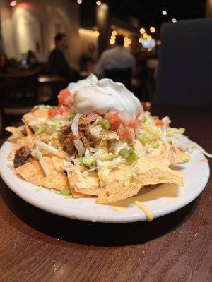 The Carnitas Nachos rock and they are half price for Happy Hour! This is a must for the table.