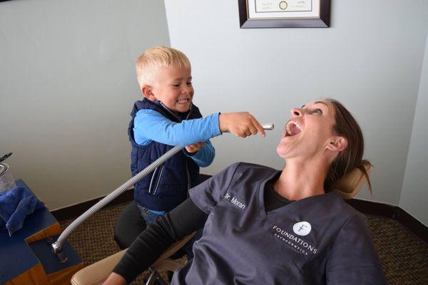 Warning - orthodontist in training! Dr. Moran's youngest, Keith, decided that mom could use some help!