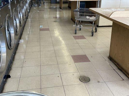 Coin Op floors covered in trash and debris