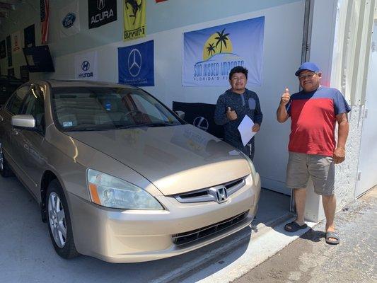 Happy family with their new Honda Accord!