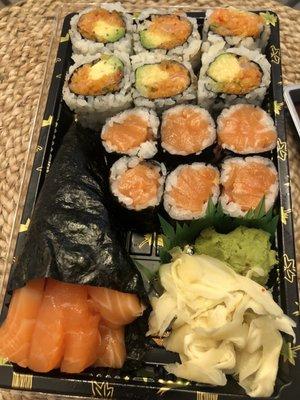 Salmon hand roll. R8. Salmon Roll. R32. Spicy Scallop and Avocado Roll (top)