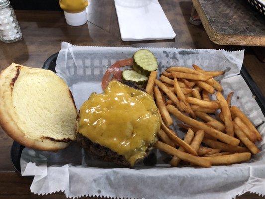 Cheeseburger with fries Lots of yummy pickles!