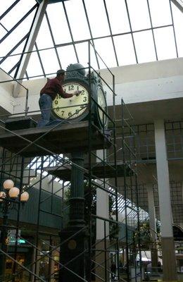 Brian Bullard maintains beloved Ginsberg Clock while it was at Park Lane Mall.