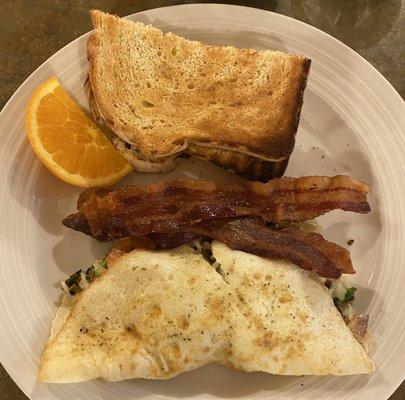 Egg white veggie omelette, bacon and sourdough bread