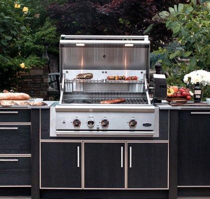 It's outdoor kitchen time. Come see us to design your dream outdoor kitchen with Naturekast cabinets.