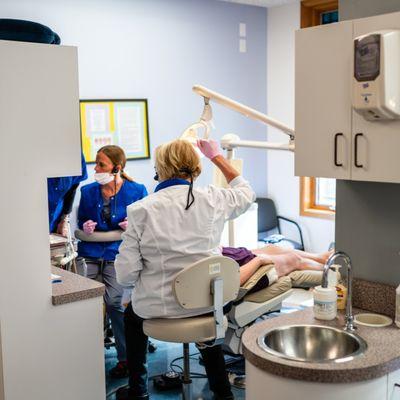 Dr. Leatha Wood performing dental implant procedure at Grand Haven Dental Care